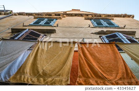 Laundry drying on a clothesline Laundry drying on a clothesline 43345627