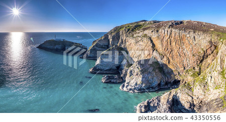 Aerial view of the beautiful cliffs close to the historic South Stack lighthouse on Anglesey - Wales Aerial view of the beautiful cliffs close to the historic South Stack lighthouse on Anglesey - Wales 43350556