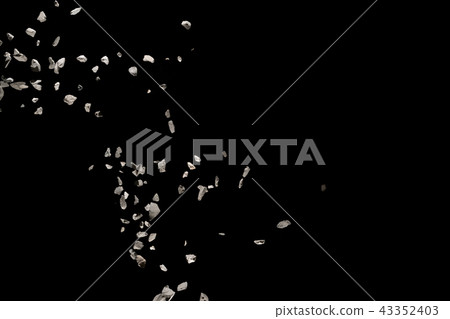 Split debris of stone exploding against black. Split debris of stone exploding against black. 43352403