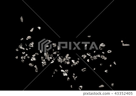 Split debris of stone exploding against black. Split debris of stone exploding against black. 43352405