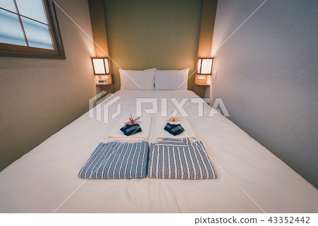 Japanese yukata and towel on bedroom in hotel 43352442