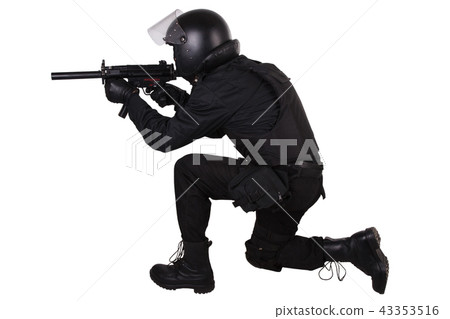 police special forces officer with submachine gun police special forces officer with submachine gun 43353516
