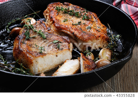 Roasted pork steak in frying pan Roasted pork steak in frying pan 43355828