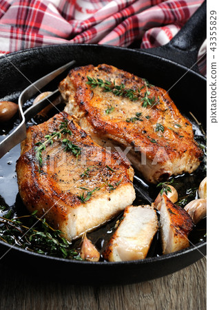 Roasted pork steak in frying pan 43355829