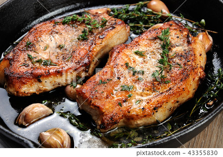 Roasted pork steak in frying pan Roasted pork steak in frying pan 43355830
