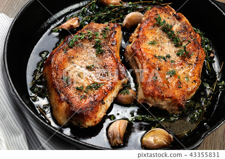 Roasted pork steak in frying pan Roasted pork steak in frying pan 43355831