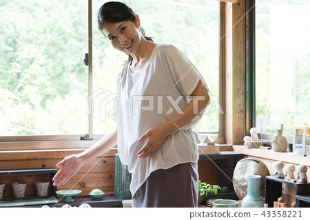 Female potter Female potter 43358221