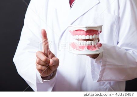 Middle Male in White Coat 43358497