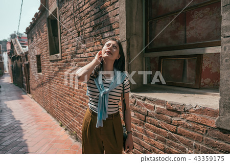 with a background of brick houses with a background of brick houses 43359175