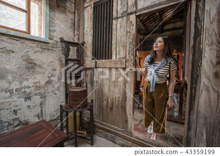woman sightseeing the old ancient building. woman sightseeing the old ancient building. 43359199