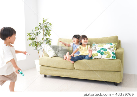 Child playing with smile 43359769