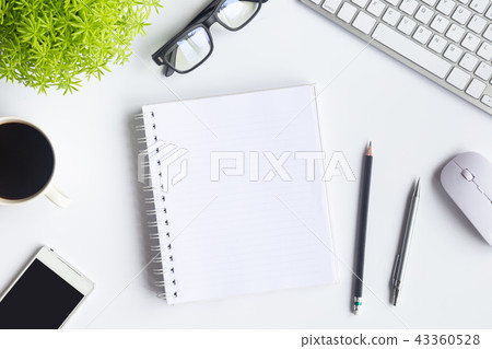 White desk office with laptop, smartphone and othe White desk office with laptop, smartphone and othe 43360528