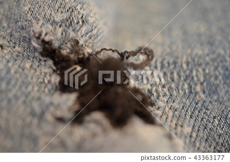 blue texture piece of jeans torned hole threads blue texture piece of jeans torned hole threads 43363177