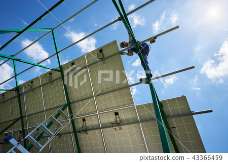 Installing solar panels on metallic carcass. 43366459