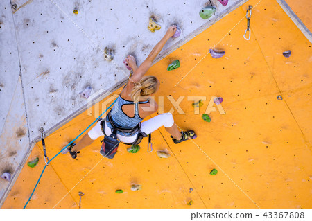girl climbing up the wall girl climbing up the wall 43367808