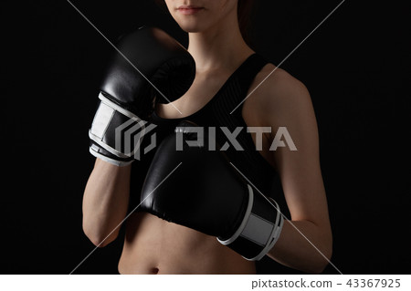 Female fighter doing boxer size Female fighter doing boxer size 43367925