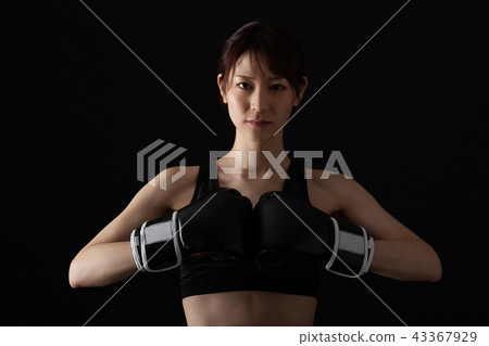 Female fighter doing boxer size 43367929