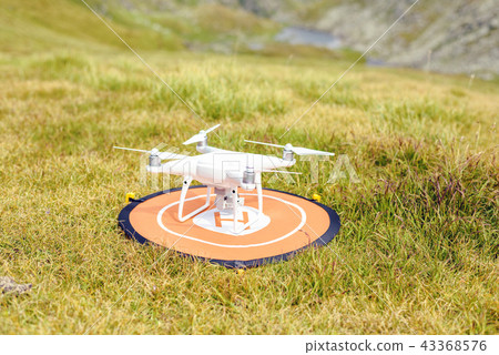 Drone preparing to take off from home point 43368576
