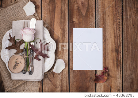 autumn table setting, decor of leaves and pumpkin. A festive dinner in a vintage style. Village autumn table setting, decor of leaves and pumpkin. A festive dinner in a vintage style. Village 43368793