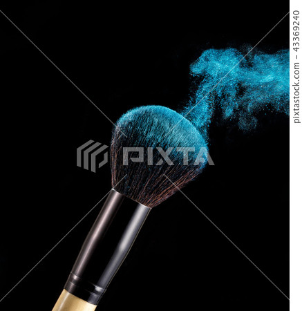 Make up brush with powder splashes on black background Make up brush with powder splashes on black background 43369240