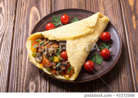 Omelette stuffed with vegetables 43372086