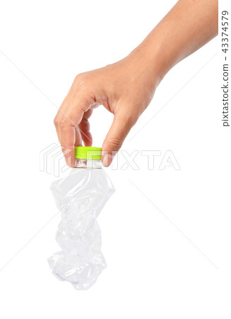 Plastic bottles recycling of a hand squeezed. 43374579