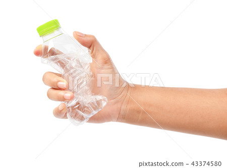 Plastic bottles recycling of a hand squeezed. 43374580