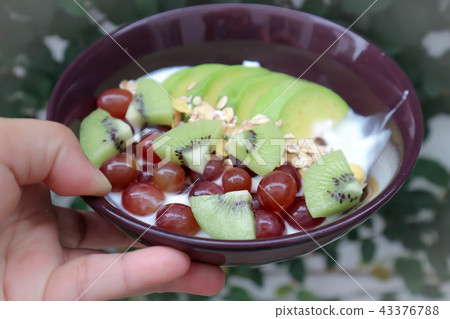 yogurt with cereal, oat, kiwi fruit and grape yogurt with cereal, oat, kiwi fruit and grape 43376788