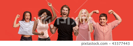 Winning success man happy ecstatic celebrating being a winner. Dynamic energetic image of male model Winning success man happy ecstatic celebrating being a winner. Dynamic energetic image of male model 43377443