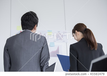 Business person man and woman back view Business person man and woman back view 43381479