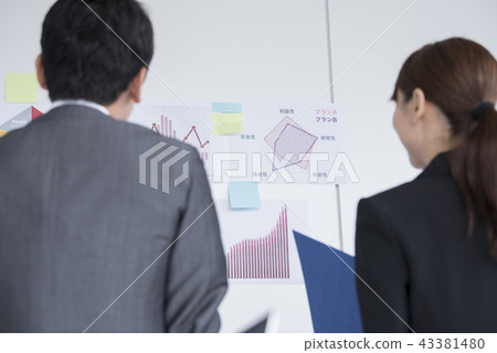 Business person man and woman back view 43381480