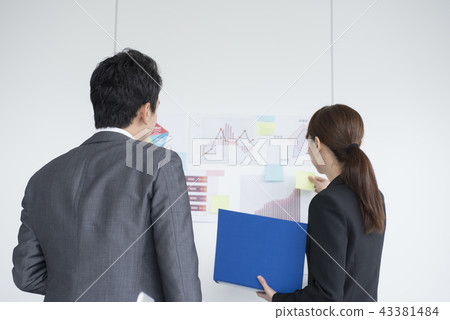 Business person man and woman back view 43381484