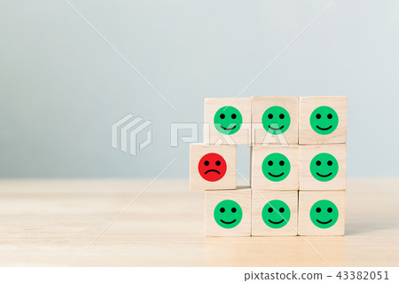 Wooden block with icon face emotion Wooden block with icon face emotion 43382051