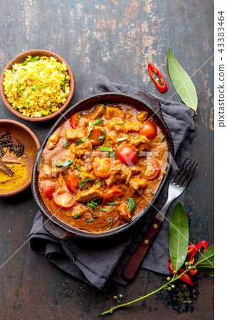 INDIAN FOOD. ROGAN JOSH curry sauce. Pork rogan josh with rice 43383464