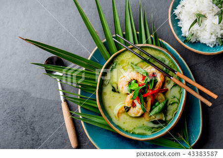 THAI SHRIMPS GREEN CURRY. Thailand tradition green curry soup with shrimps prawns and coconut milk THAI SHRIMPS GREEN CURRY. Thailand tradition green curry soup with shrimps prawns and coconut milk 43383587