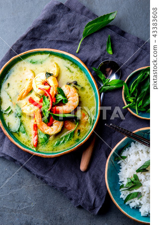 THAI SHRIMPS GREEN CURRY. Thailand tradition green curry soup with shrimps prawns and coconut milk 43383608