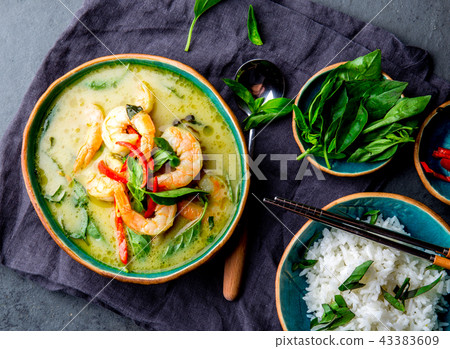 THAI SHRIMPS GREEN CURRY. Thailand tradition green curry soup with shrimps prawns and coconut milk THAI SHRIMPS GREEN CURRY. Thailand tradition green curry soup with shrimps prawns and coconut milk 43383609