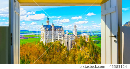 view of the famous tourist attraction in the Bavarian Alps - the 19th century Neuschwanstein castle. 43385124