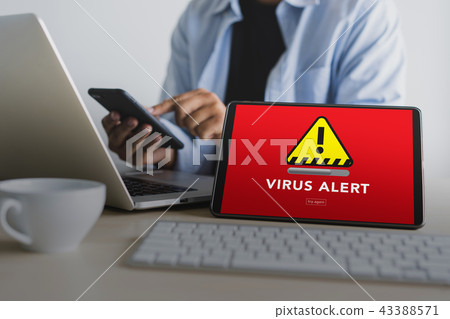 Hacker Protection Concept Man working on laptop 43388571