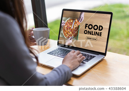 Close up woman ordering food online by internet Close up woman ordering food online by internet 43388604