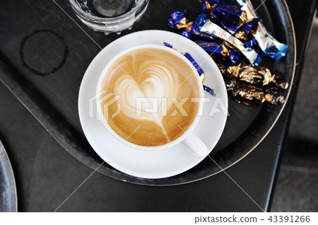 foam on cappuccino in the form of a heart foam on cappuccino in the form of a heart 43391266