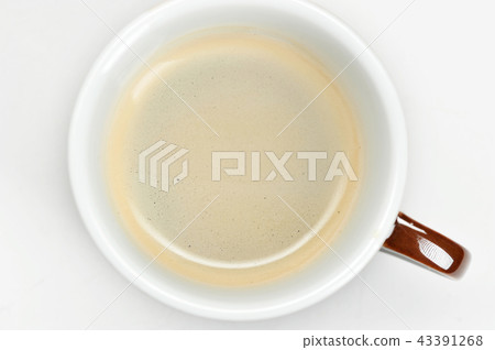coffee foam in a coffee mug 43391268