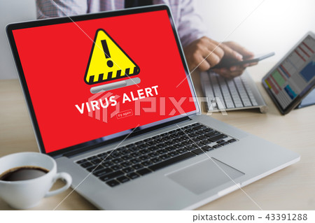 Hacker Protection Concept Man working on laptop 43391288
