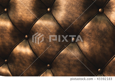 Surface of a rhombic split skin with buttons on the back of the bed. Rhombic patterns of bulk skin 43392183