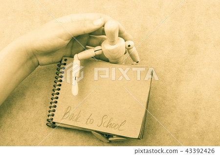 Back to school lettering in arm 43392426