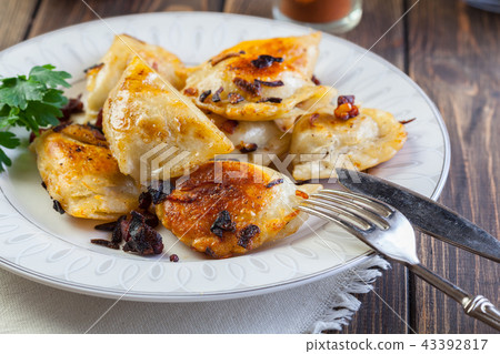 Fried dumplings with meat Fried dumplings with meat 43392817