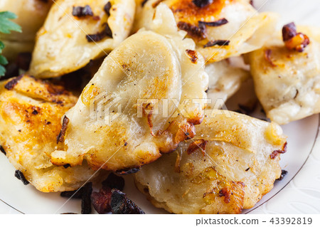 Fried dumplings with meat Fried dumplings with meat 43392819