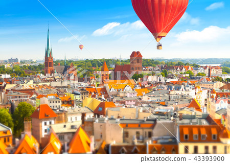 Panoramic view of historical buildings and roofs in Polish medieval town Torun Panoramic view of historical buildings and roofs in Polish medieval town Torun 43393900
