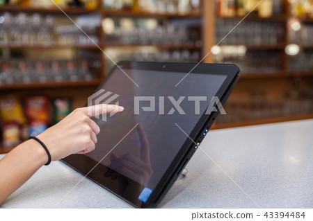 Touchscreen's cash register in the restaurant Touchscreen's cash register in the restaurant 43394484