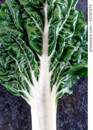 Mangold on black background. Top view Mangold on black background. Top view 43395875